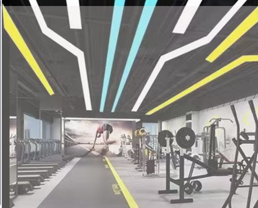 Linear fittings installed across a gym ceiling